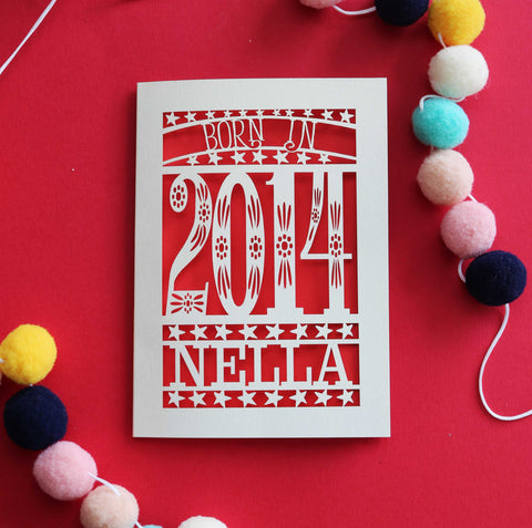 A laser cut tenth birthday card, personalised with a name and the words, "Born in 2014"