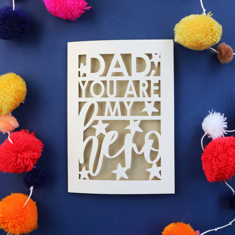 Cut out fathers day cards that say "Dad, you are my hero" with stars around the text and a gold leaf coloured paper backing - A6 (small) / Gold Leaf