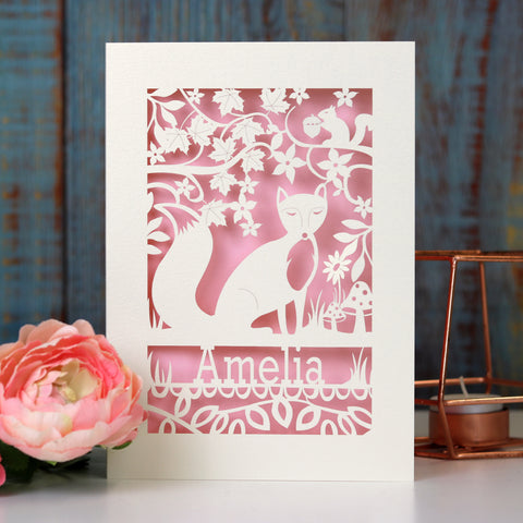 A kid's birthday card with a fox and woodland scene on it. Card is personalised with a name. - A5 (large) / Candy Pink
