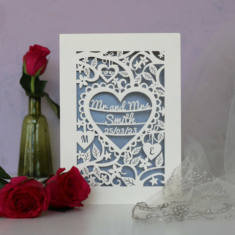 A personalised laser cut wedding card with flowers, hearts and a name and date.  - A5 / Silver