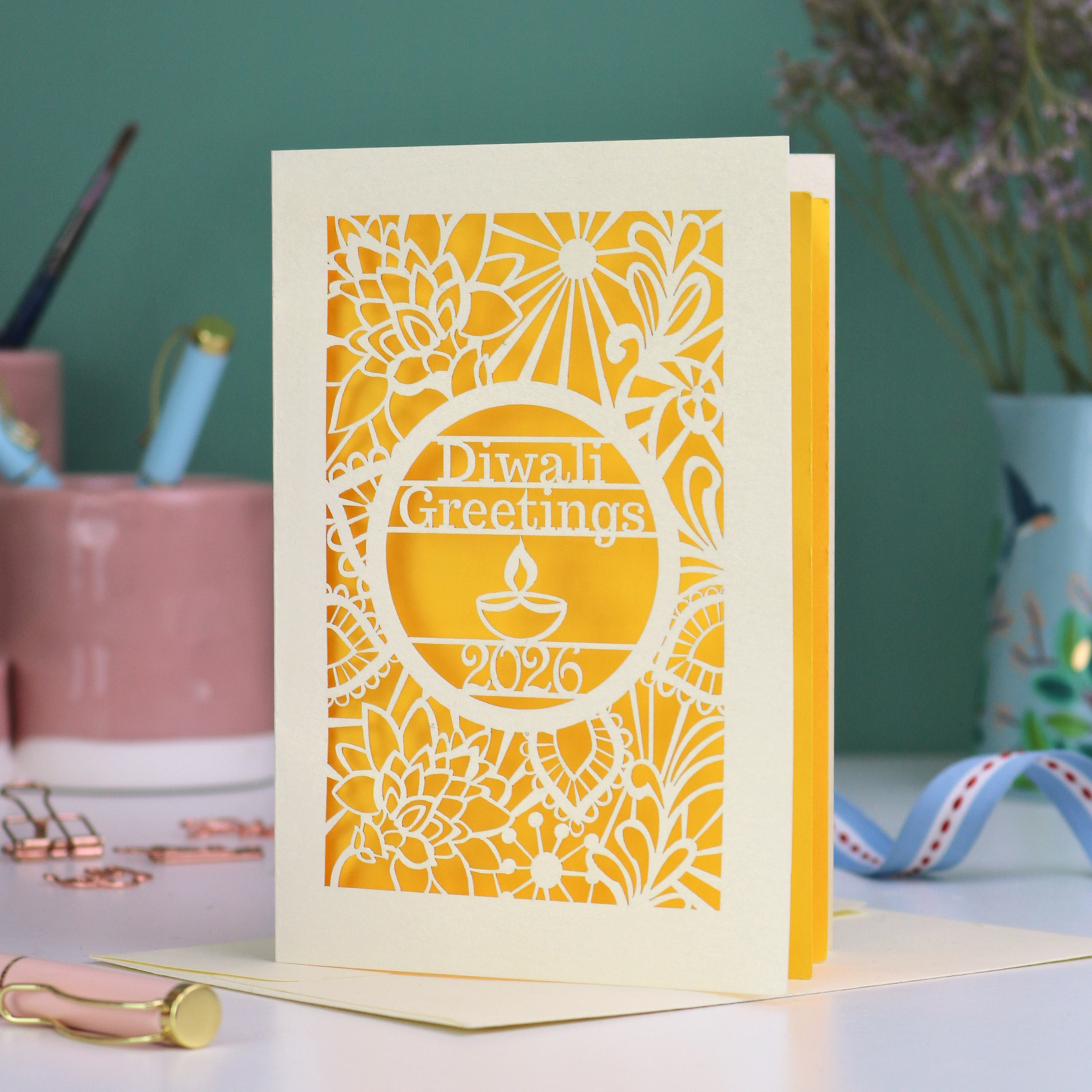 A laser cut Diwali card