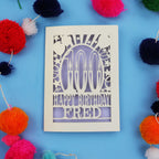 100th Birthday card with 'Happy Birthday Fred' text on a blue background with colourful pom-poms.