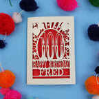 100th Birthday card with 'Happy Birthday Fred' text on a blue background with colourful pom-poms.