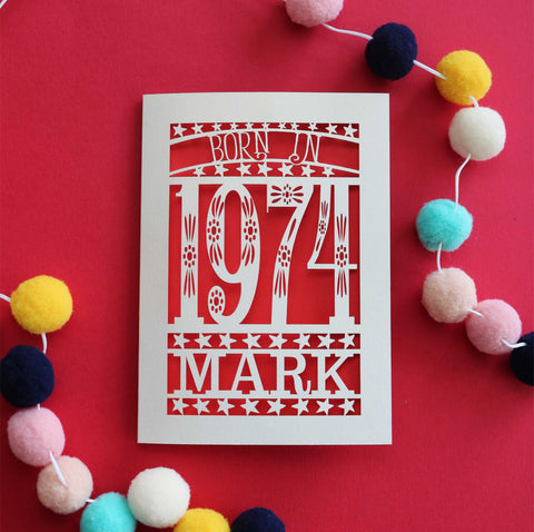 A laser cut birthday card for people born in 1974