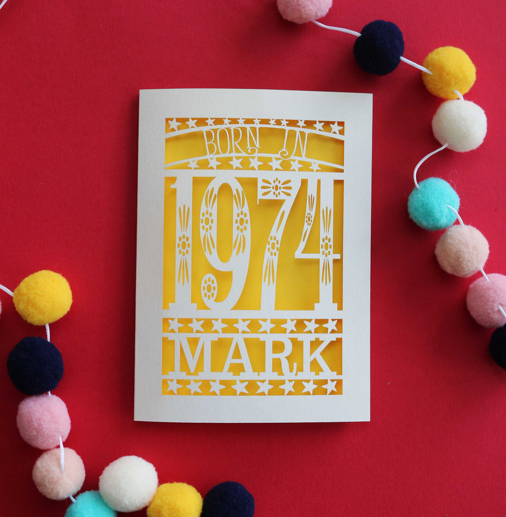 A laser cut birthday card for people born in 1974