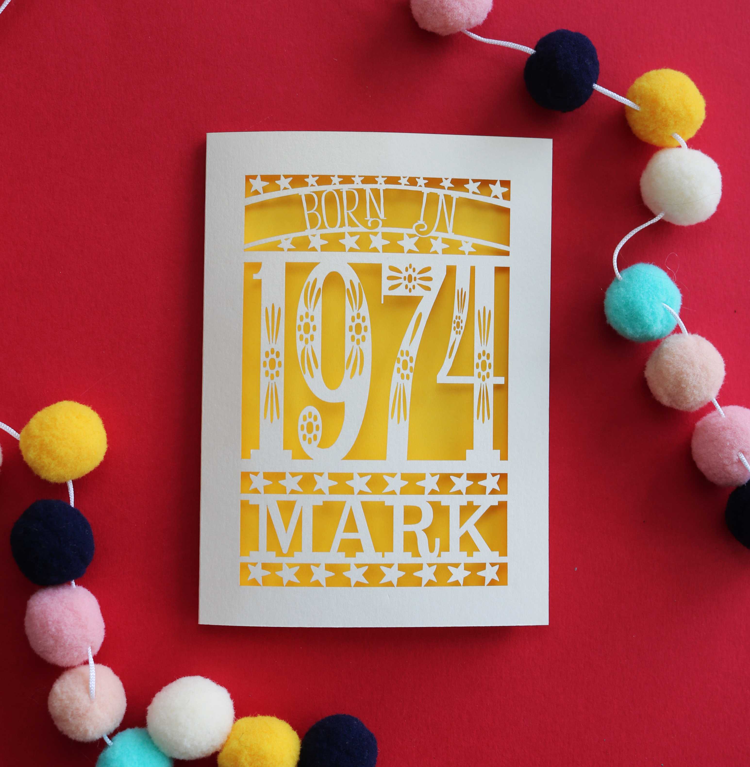 A laser cut birthday card for people born in 1974