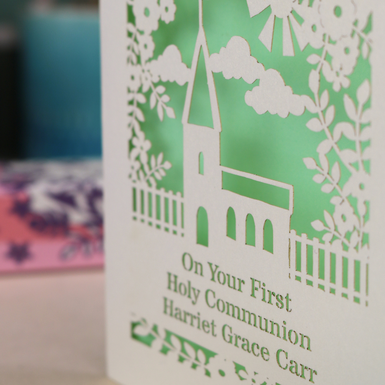 Card with a church design and text on a green background
