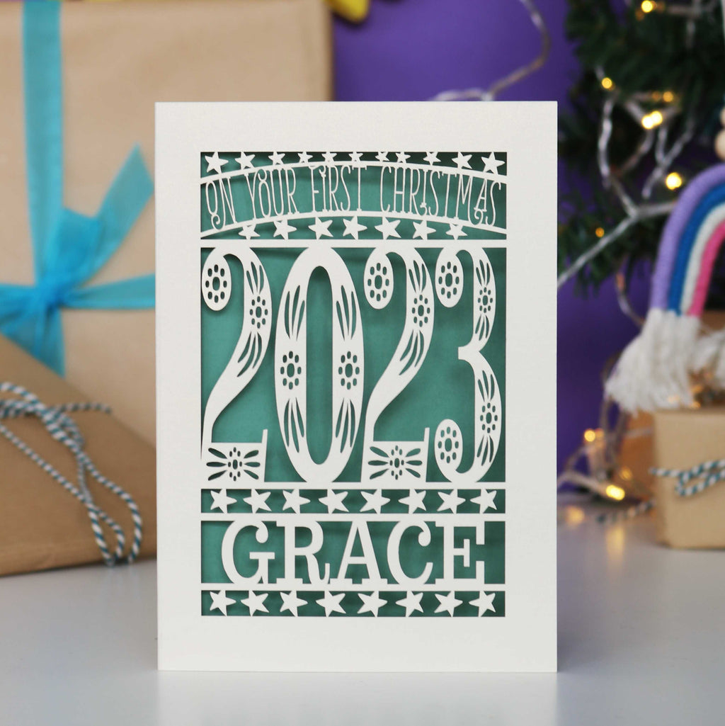 A beautiful sage and cream personalised papercut for a 1st Christmas.