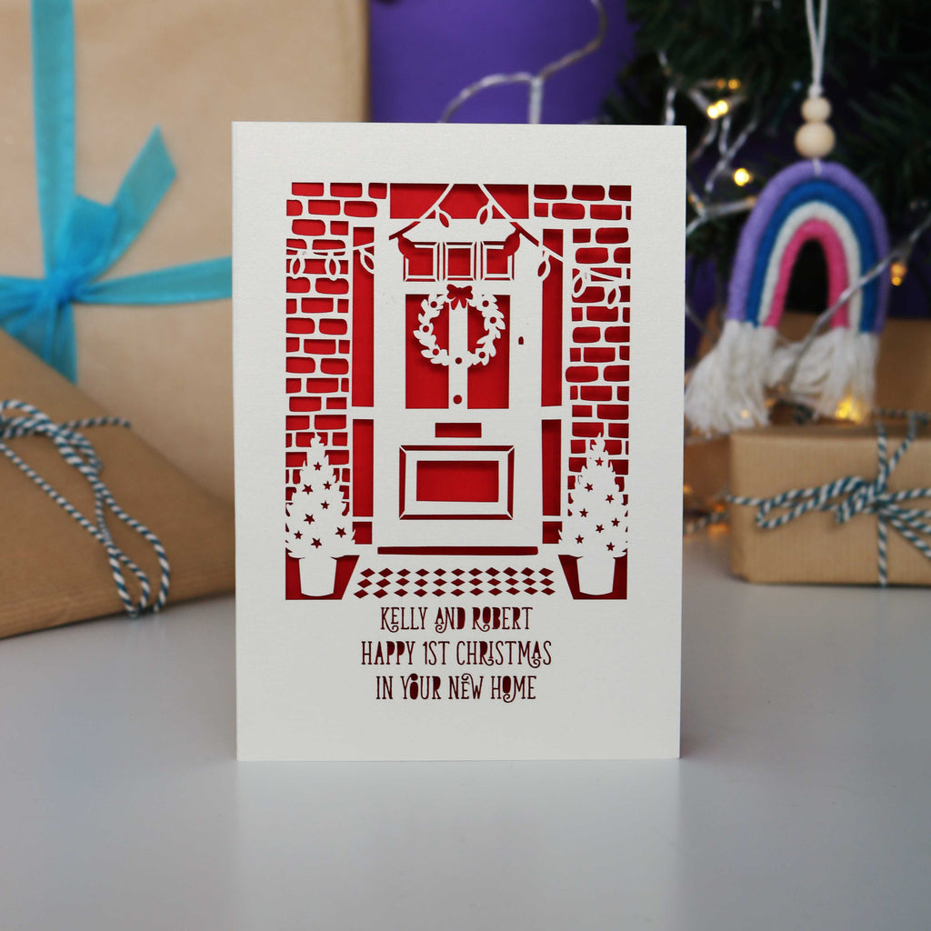 A paper cut card for a first Christmas in their new home
