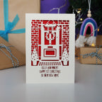 A paper cut card for a first Christmas in their new home