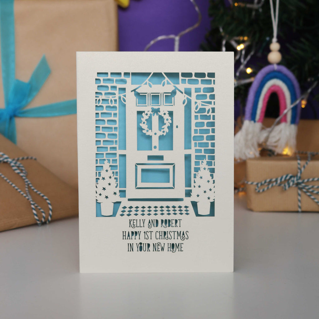 A laser cut first xmas in your new home Christmas card