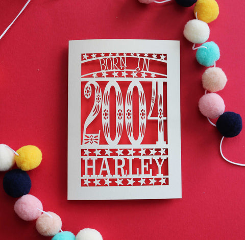A laser cut 20th birthday card for people born in 2004