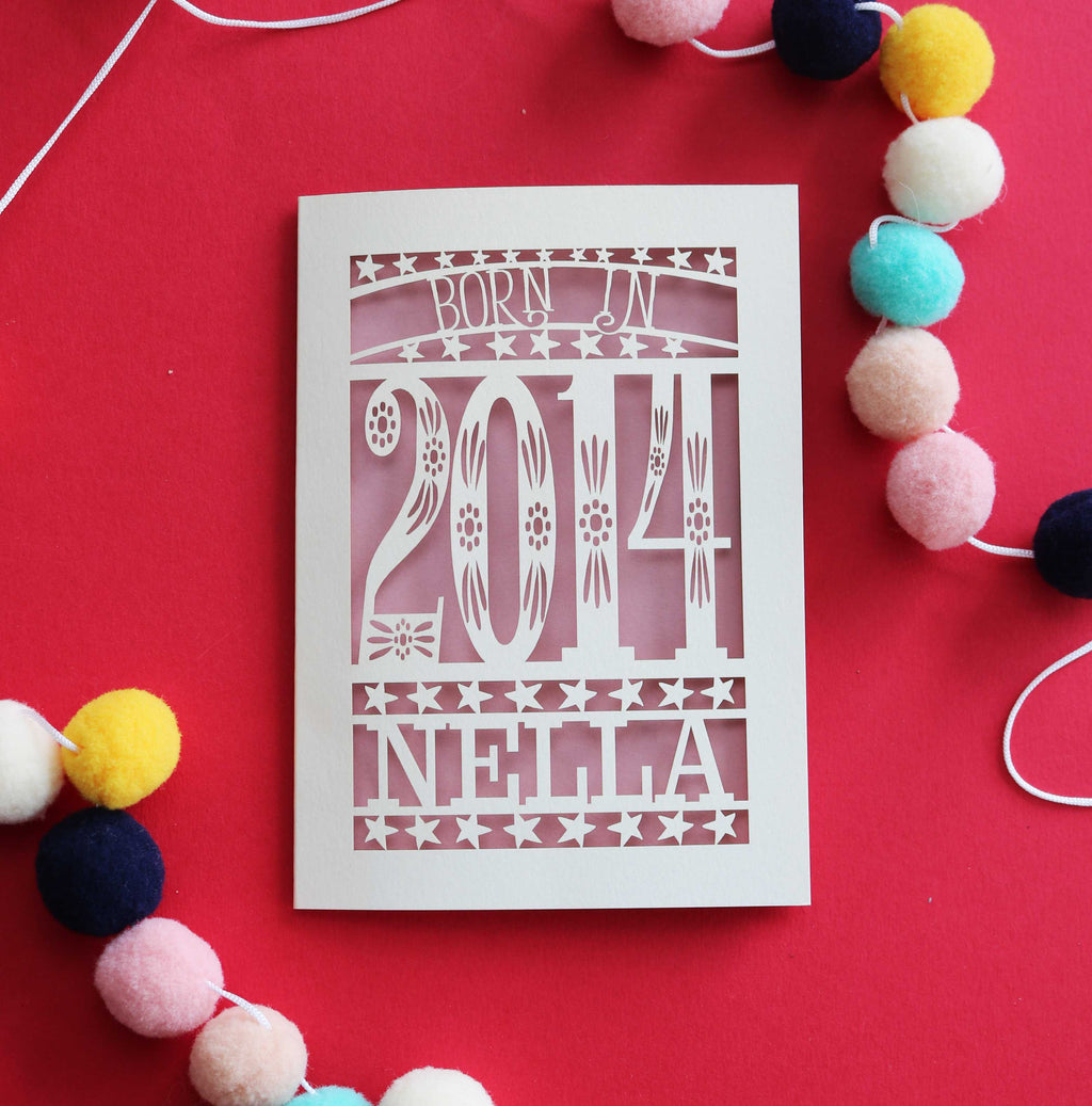 A laser cut 10th birthday card, personalised with a name and the words, "Born in 2014"