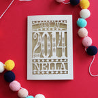 A cut out tenth birthday card, personalised with a name and the words, "Born in 2014"