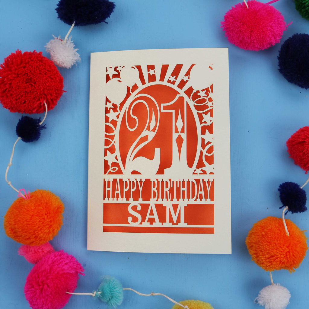 Personalized 21st birthday card with colourful pom-poms on a blue background