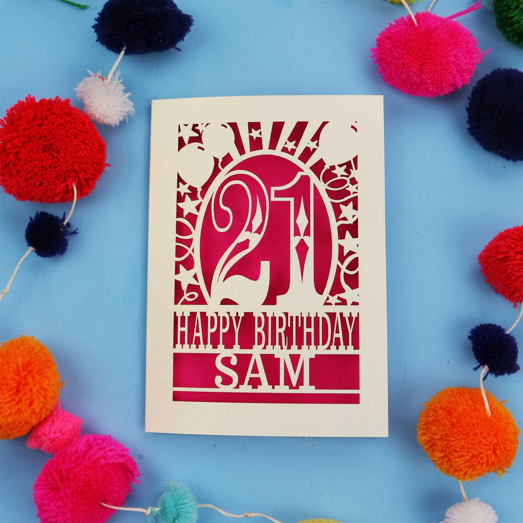 Personalized 21st birthday card with colourful pom-poms on a blue background