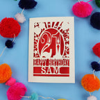 Personalized 21st birthday card with colourful pom-poms on a blue background