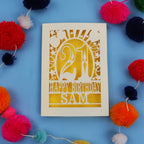 Personalized 21st birthday card with colourful pom-poms on a blue background