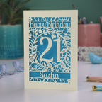 21st Birthday card with 'Happy Birthday Sasha' on a laser cut floral background