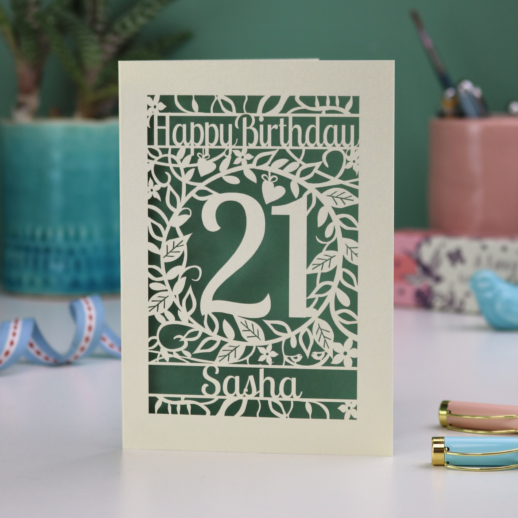 21st Birthday card with 'Happy Birthday Sasha' on a laser cut floral background