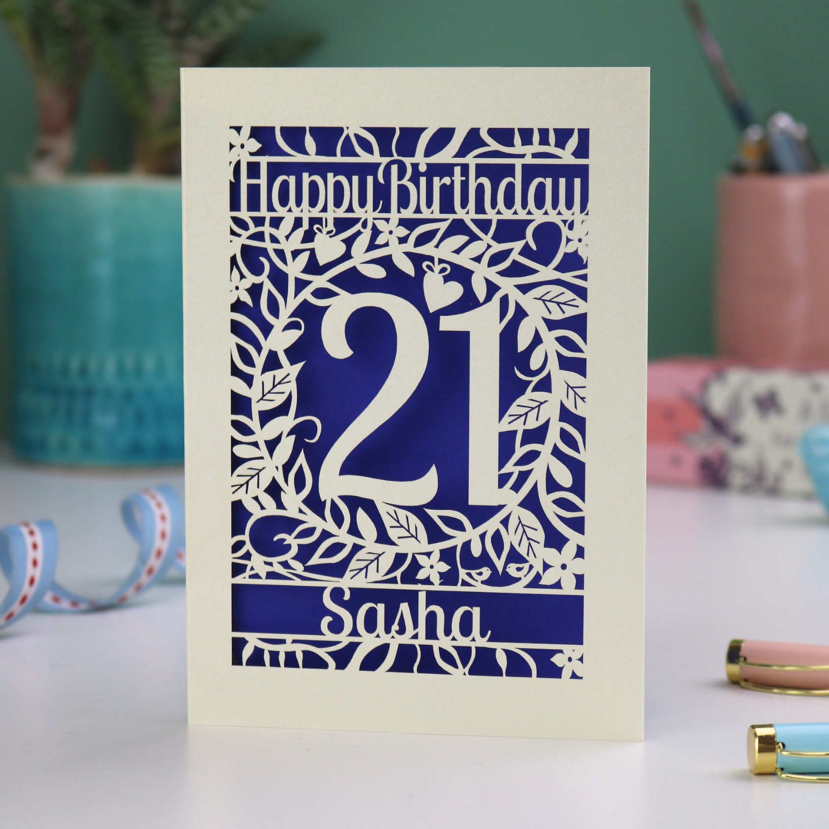 21st Birthday card with 'Happy Birthday Sasha' on a laser cut floral background