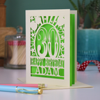 A personalised 30th birthday card with laser cut 30 design and text "Happy Birthday Adam"