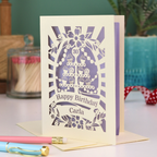 Personalised 30th birthday card with decorative laser cut cupcake design on a table with stationery items.