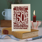 A laser cut Golden anniversary card personalised for Mom and Dad, 50 Amazing years