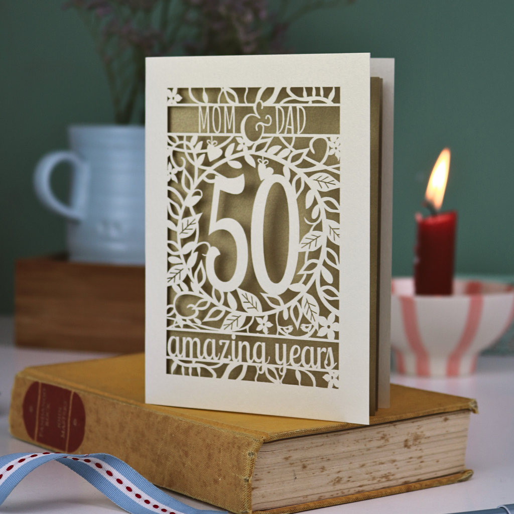 A laser cut Golden anniversary card personalised for Mom and Dad, 50 Amazing years