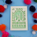 Personalised Happy 50th birthday card with colourful pom-poms on a blue background