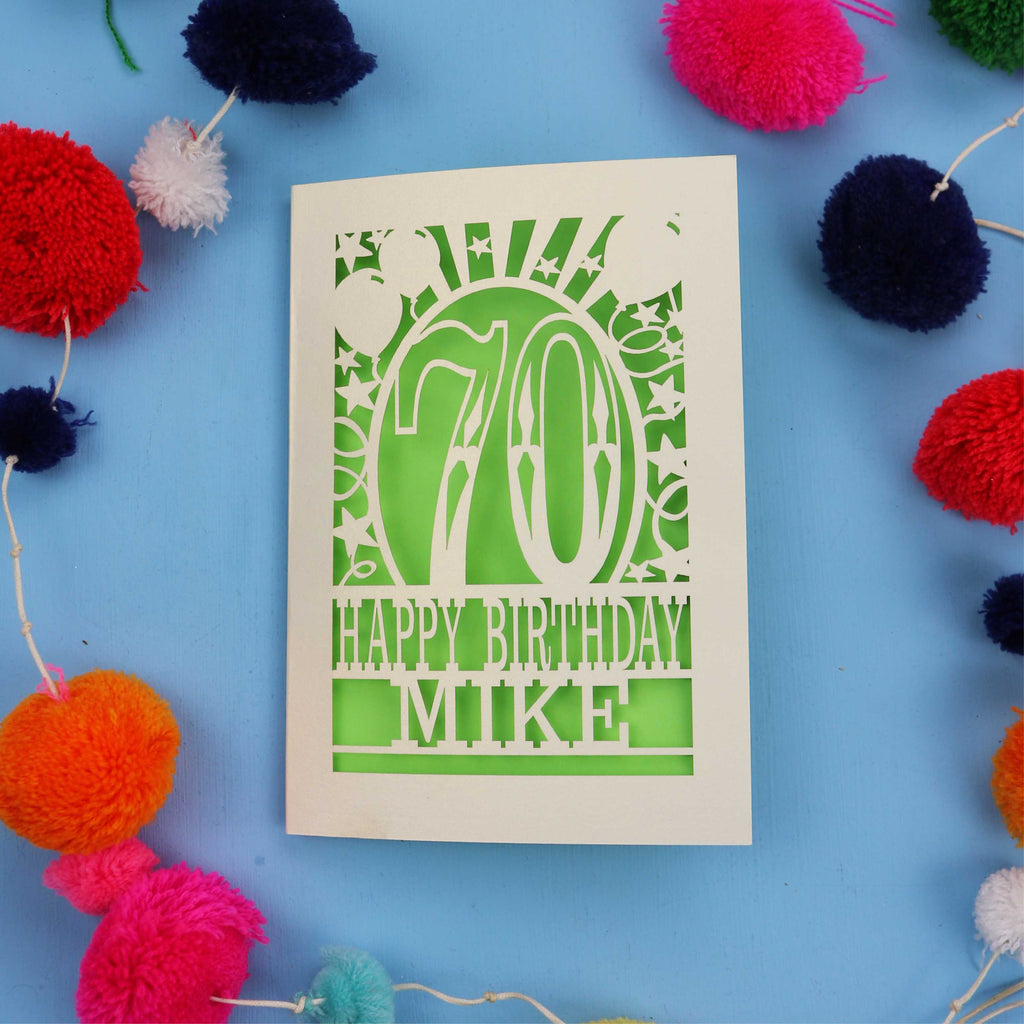Laser cut personalised 70th birthday card with balloons, stars and the number 70 in a bold circus font.