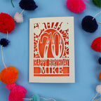 Laser cut personalised 70th birthday card with balloons, stars and the number 70 in a bold circus font.