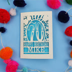 Laser cut personalised 70th birthday card with balloons, stars and the number 70 in a bold circus font.