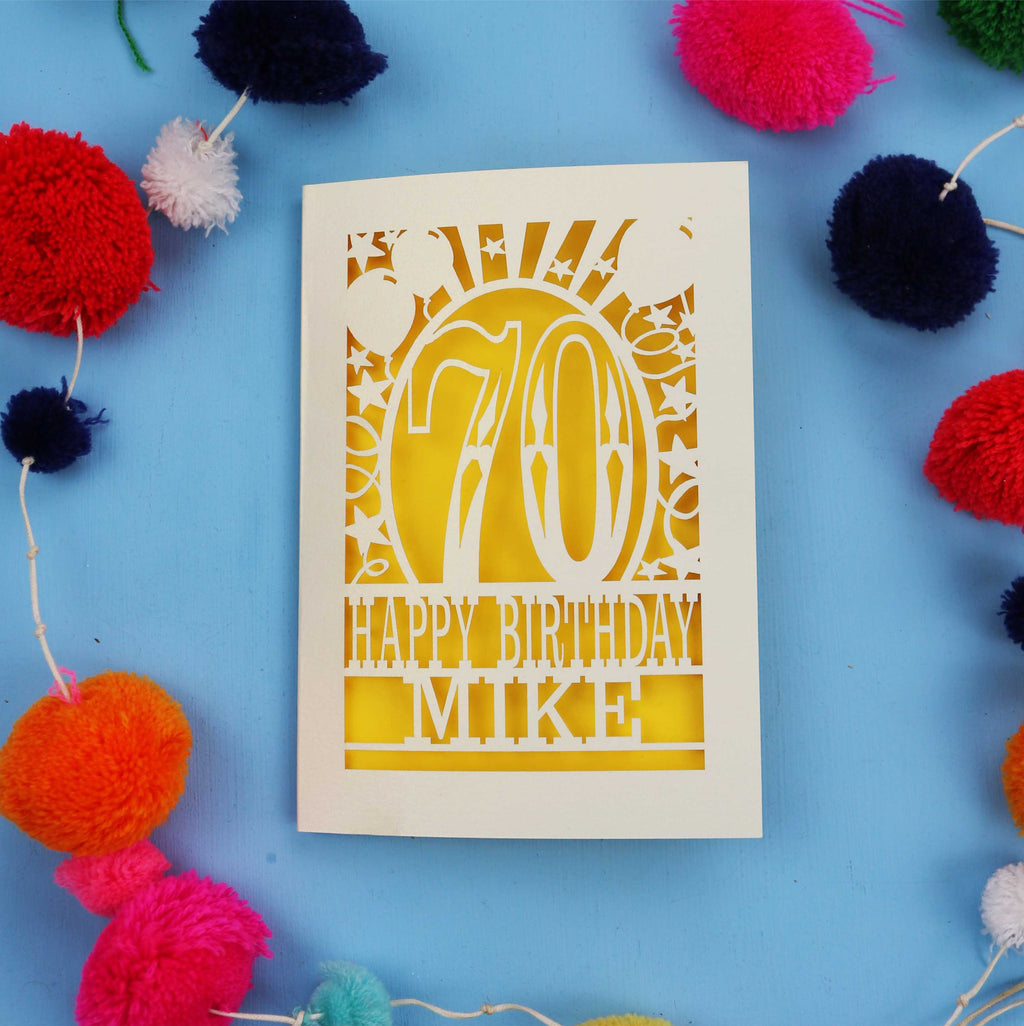 Laser cut personalised 70th birthday card with balloons, stars and the number 70 in a bold circus font.