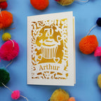 A luxury cut out 70th birthday card with cupcake design and personalised with a name