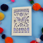 80th Birthday Card with butterfly design and 'Happy Birthday Mum' text on a blue background with colourful pom-poms.