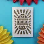 A laser cut unusual father's day card that says "Dad, A son's first hero, a daughter's first love"