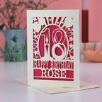A laser cut age birthday card, with the number 18 and text 'Happy Birthday Rose'