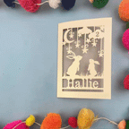 A stop motion video showing a laser cut bunny birthday card opening and closing