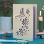 a laser cut 3D butterfly card with lilac paper insert