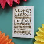 A meaningful father's day card laser cut with the words "dads are ordinary men turned by love into heroes, adventurers, storytellers and singers of song"