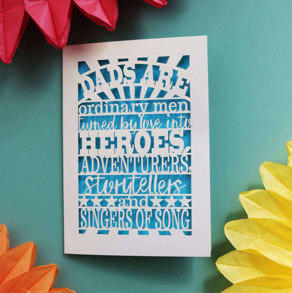 father's day cards laser cut with the words "dads are ordinary men turned by love into heroes, adventurers, storytellers and singers of song"