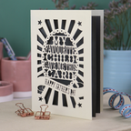 A laser cut funny Father's Day card with the cut out text, "My favourite child gave me this card. Happy Father's Day"