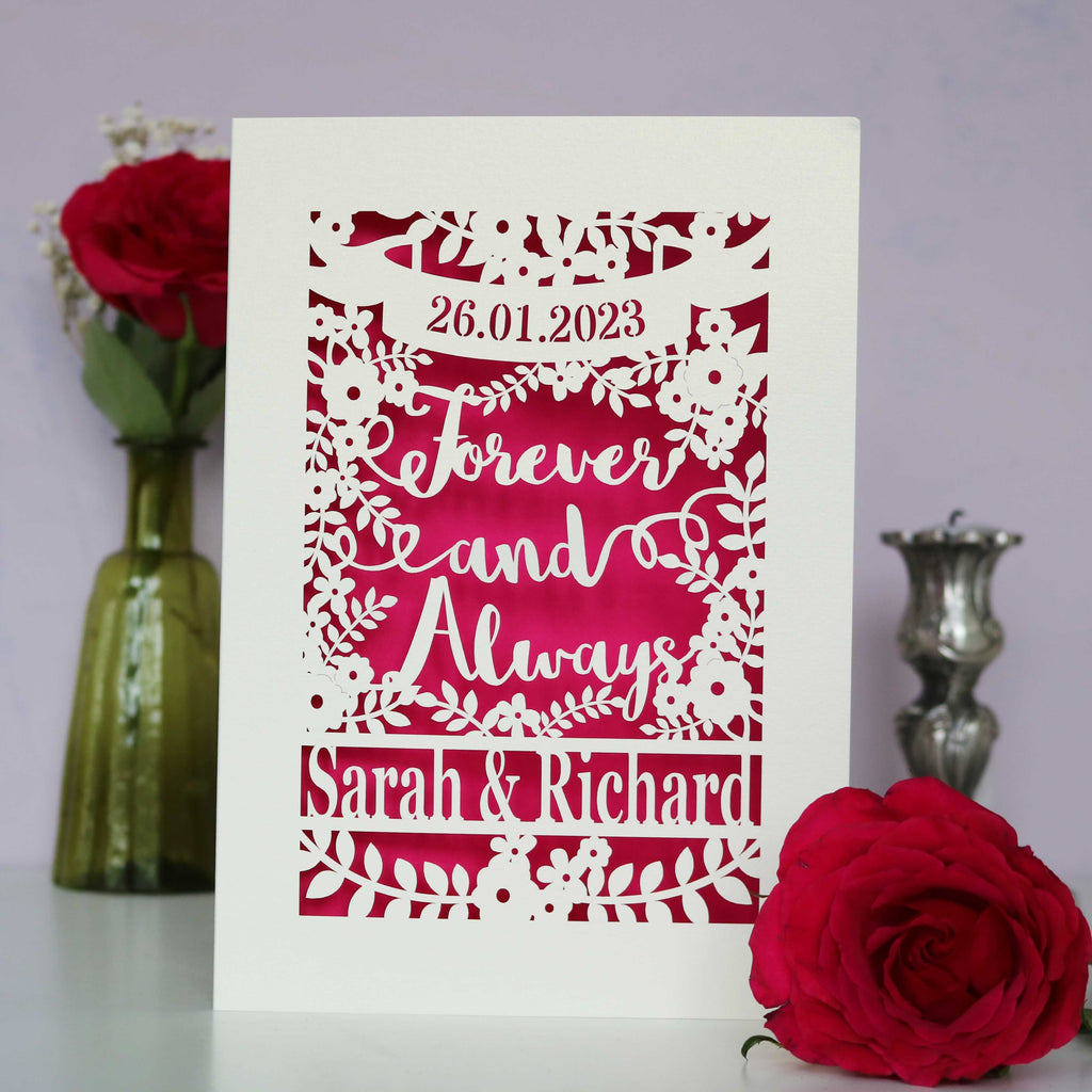 A personalised engagement card that says Forever and Always, and is personalised with a date and the names of the couple.