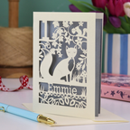 A laser cut first birthday card with fox design and personalised with "1" and "Emmie"