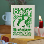 A laser cut birthday card with woodland scene and fox cut out design, personalised with an age in the top left, and a name at the bottom. 