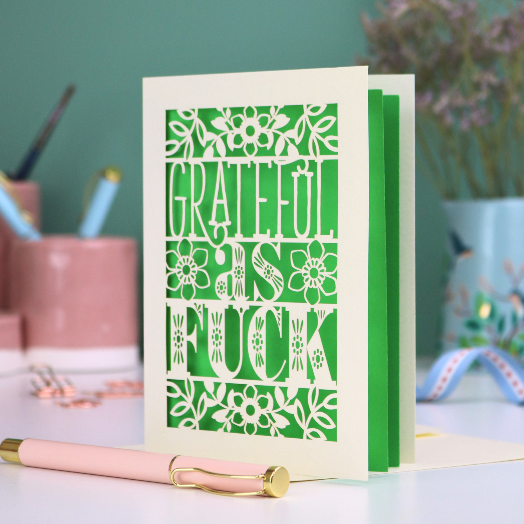 A funny, rude thank you card with sweary text, "Grateful As Fuck", surrounded by floral cut out design