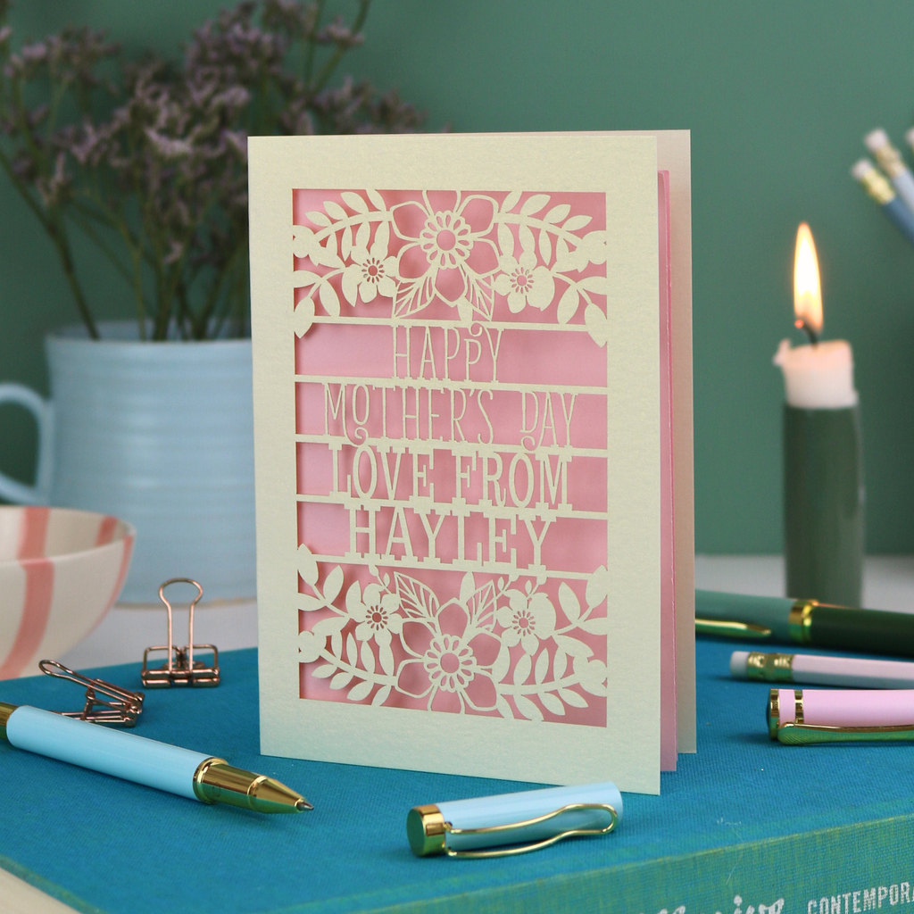 A personalised laser cut Mother's Day card with floral design and the text "Happy Mother's Day Love From Hayley"