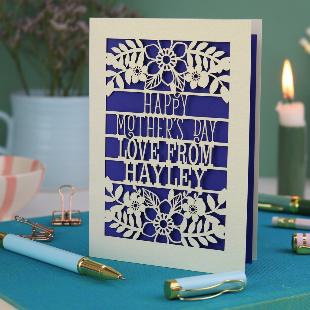 A personalised laser cut Mother's Day card with floral design and the text "Happy Mother's Day Love From Hayley"