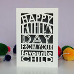 A laser cut fathers day card that says "Happy Father's Day from your favourite child"